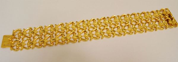Bracciale  in oro giallo a fascia larga a maglie snodate  g 36,5  - Asta Arredi, oggetti d'arte, dipinti - Poggio Bracciolini Casa d'Aste