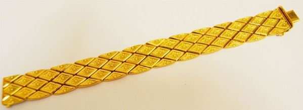 Bracciale in oro giallo a fascia larga a maglie romboidali snodate g 38