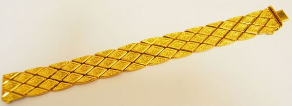 Bracciale in oro giallo a fascia larga a maglie romboidali snodate g 38