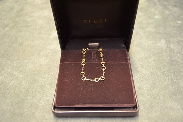 Bracciale, Gucci, in oro giallo entro astuccio originale lavorato a staffe, punzone 750, g 7