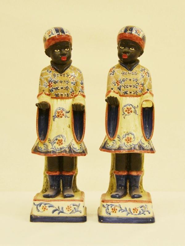 Coppia di sculture, sec. XIX, in porcellana policroma, FIGURE, alt. cm 46, difetti e mancanze ( 2 )