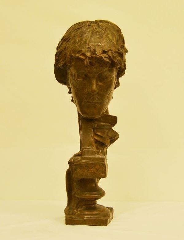 Scultura, sec. XX, in bronzo, TESTA DI UOMO, alt. cm 62