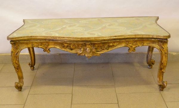 Tavolino da parete, in stile '700, in legno intagliato e dorato, piano in vetro, cm 106x53x41, gambe da restaurare