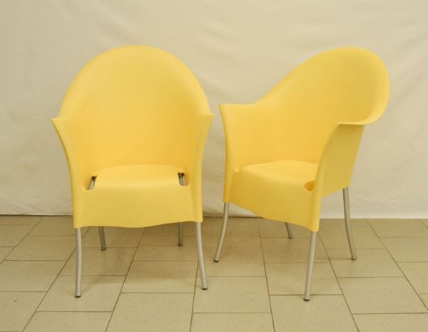 Coppia di poltroncine, manifattura Driade, modello Lord Yo, in plastica color pesca, gambe in alluminio ( 2 )