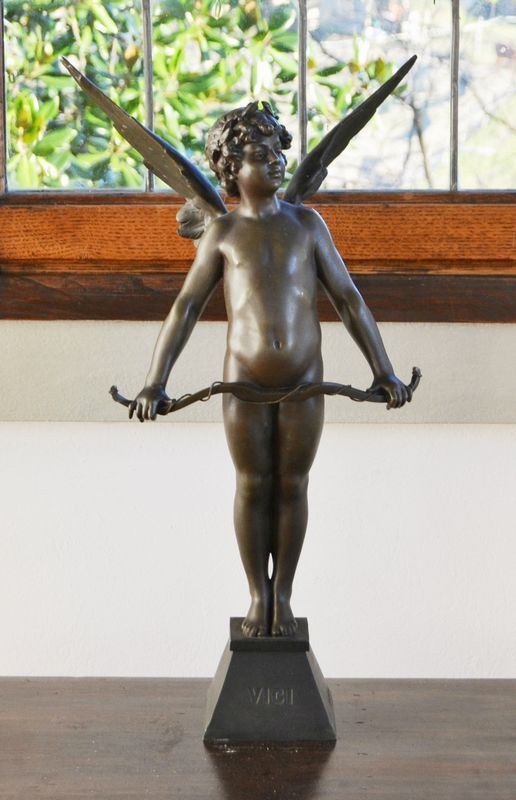 Scultura, Francia, sec. XX, in bronzo, PUTTO CON ARCO, alt. cm 62