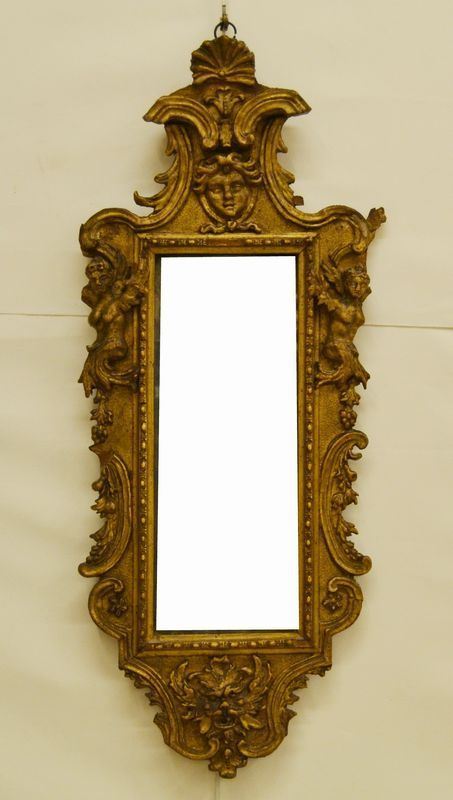Specchiera, Toscana, inizi sec. XIX, entro cornice coeva, in legno dorato e intagliato a figure mitologiche, cm 34x82, difetti