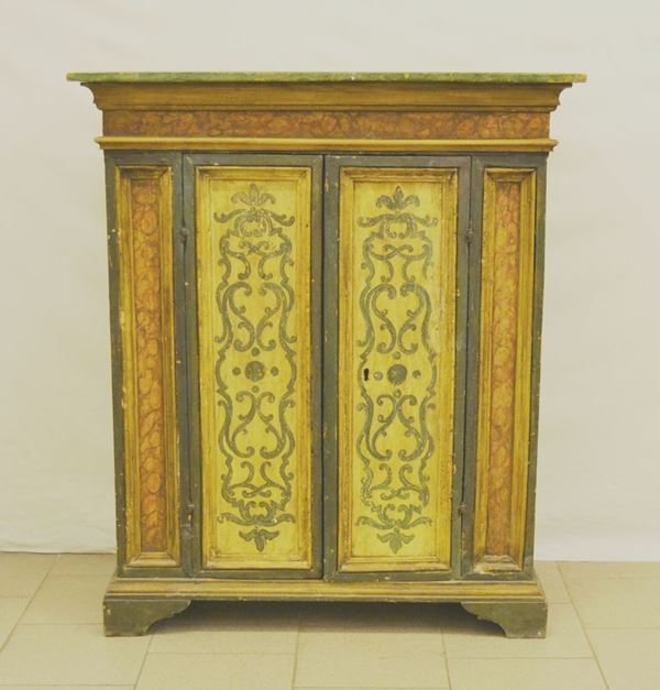 Credenzino, Francia, sec. XIX, in legno laccato e decorato, due sportelli, piedi a mensola, cm 98,5x44,5x115, difetti e restauri