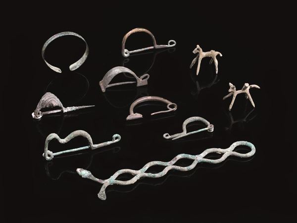 Manico di cucchiaio in bronzo a doppio filo a serpente