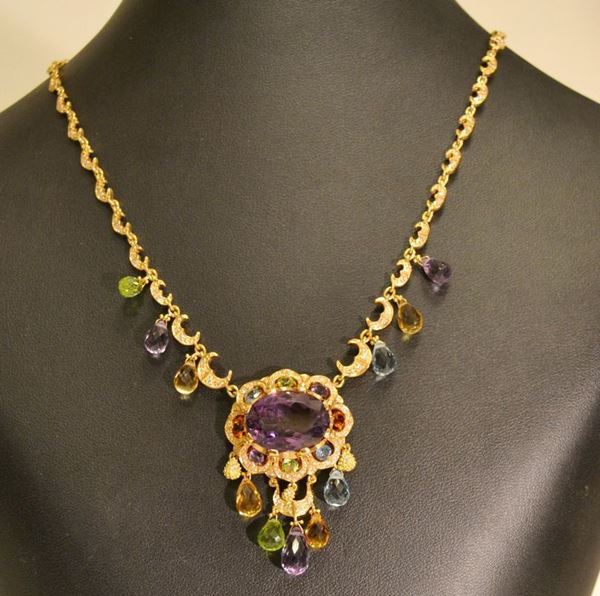 Collana in oro giallo con finale decorato da ametista, brillantini  e pietre mix g 26,4