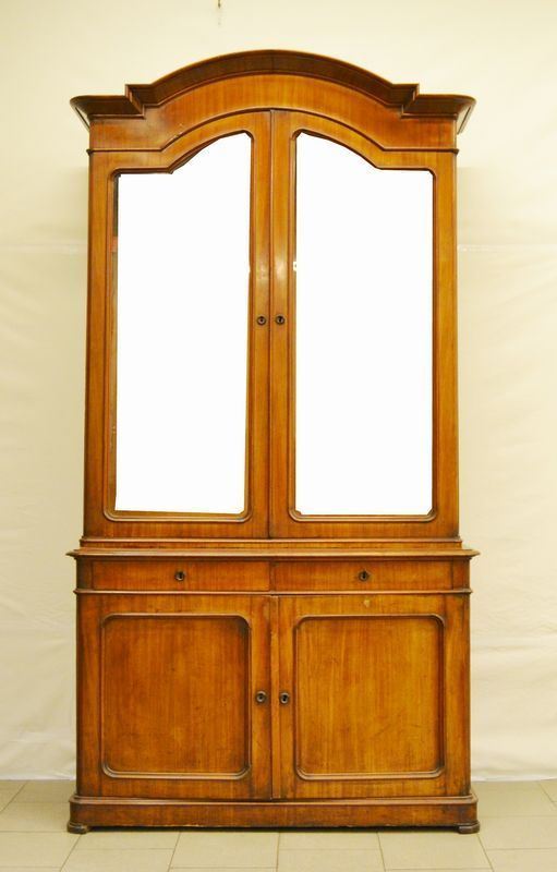 Mobile vetrina, Toscana, sec. XIX, in noce, a quattro sportelli di cui due in vetro e due cassetti, cm 127x48x243