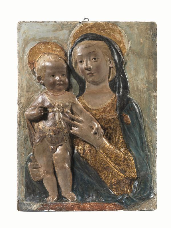 MADONNA CON BAMBINO  bassorilievo in gesso policromo, cm 58x43  danni  Si tratto di un calco moderno da un modello riferito a Rosselli (Pistoia 1439-Fossombrone 1497/98), di cui si conoscono solo esemplari in stucco (conservati presso collezioni pubbliche e private), a sua volta derivato da una composizione verrocchiesca. 