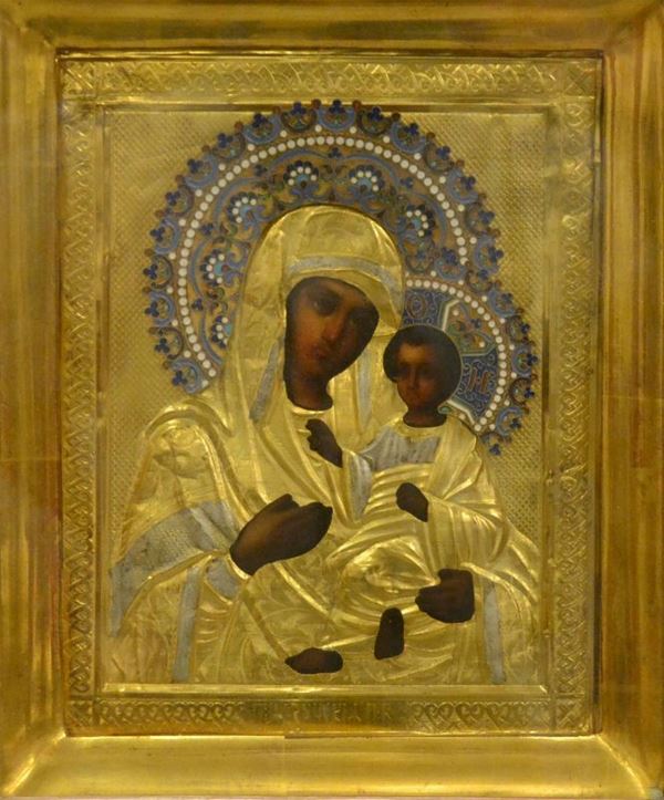 Icona con rizza in metallo dorato, raffigurante MADONNA CON BAMBINO, entro teca in legno