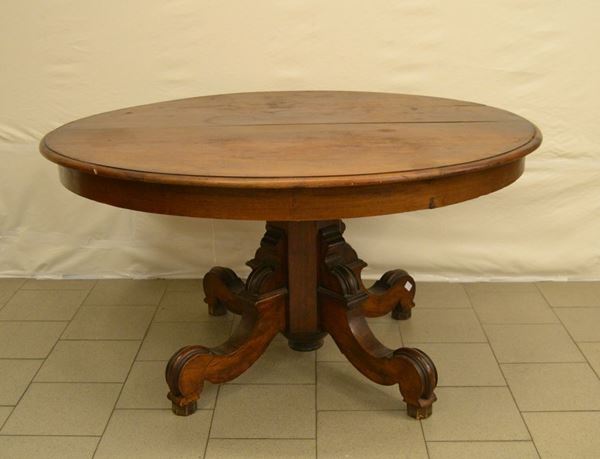Tavolo, Toscana, sec. XIX, in noce, piano ovale allungabile, piedi mossi, cm 150x128x78