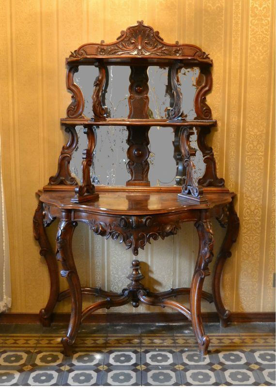 Consolle, Toscana, sec. XIX, in noce intagliato, fronte e laterali sagomati, fondo a specchio, cm 120x61x182