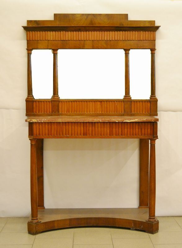Console, Siena, inizi sec. XIX, piano in marmo di epoca posteriore, un cassetto, gambe a colonna, e sovrastante specchiera, cm 122x53x180