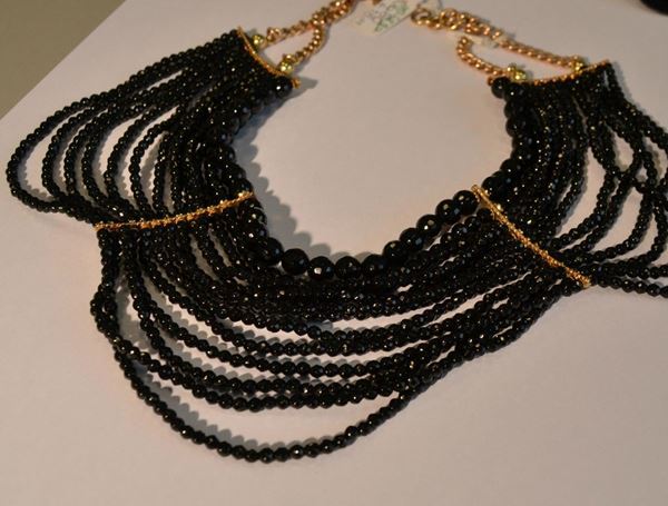 Collana con 13 fili di onice sfaccettati e parti in oro titolo 375         