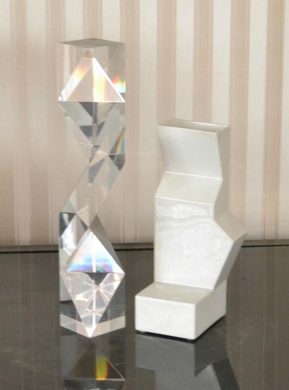  Due soprammobili, anni 70,  FORME GEOMETRICHE, in ceramica e plexiglass, alt. cm 50 e cm 35 ( 2 ) 