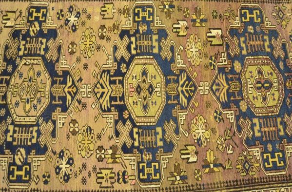  Tappeto caucasico SUMAK, sec. XIX, con medaglioni blu, cm 195x125  
