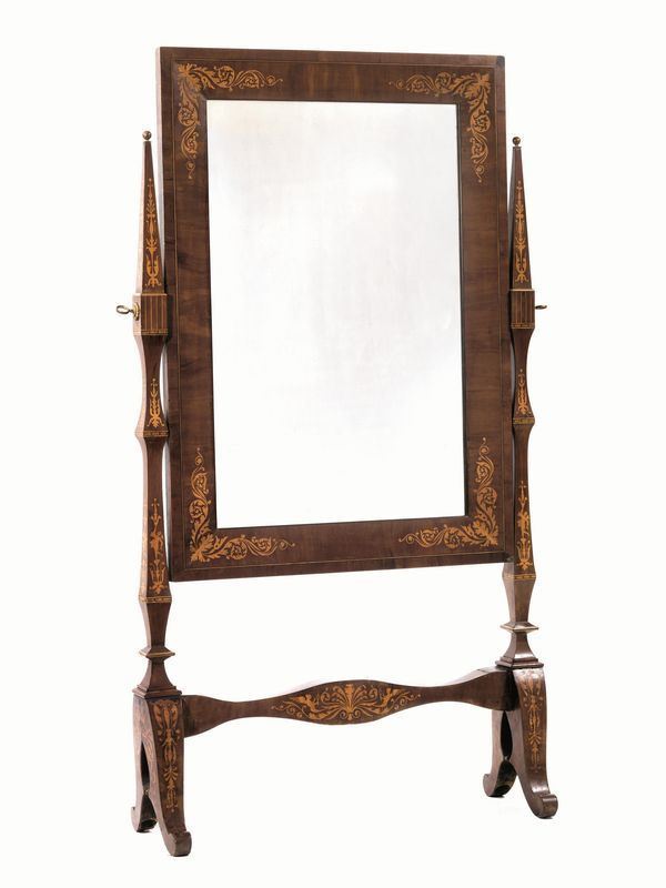  Grande specchiera a psiche, sec. XIX, in stile Carlo X,  in noce intarsiato in acero, specchio rettangolare decorato con grandi volute di foglie di acanto negli angoli sostegni terminanti ad obelisco, gambe a volute contrapposte, riunite da traversa sagomata, cm 192x105