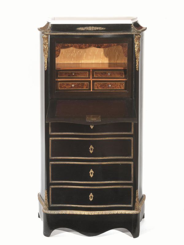  Piccolo secretaire, Francia, fine sec. XIX,  in legno ebanizzato con applicazioni in bronzo dorato, piano superiore sagomato in marmo bianco di epoca posteriore, sportello a calatoia, scarabattolo interno in acero e radica di tuja, con cassetti e vano a giorno, quattro cassetti sottostanti, fronte e fianchi mossi, base modanata, cm 54x33x122