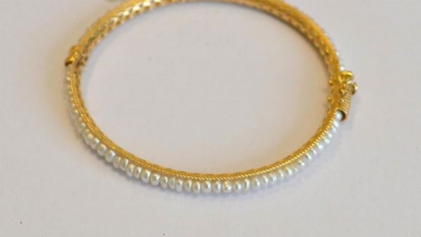 Bracciale in oro giallo, decorato da perline, g 13