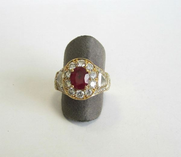 Anello in oro giallo e bianco,  con rubino e brillanti, g 9,3                   