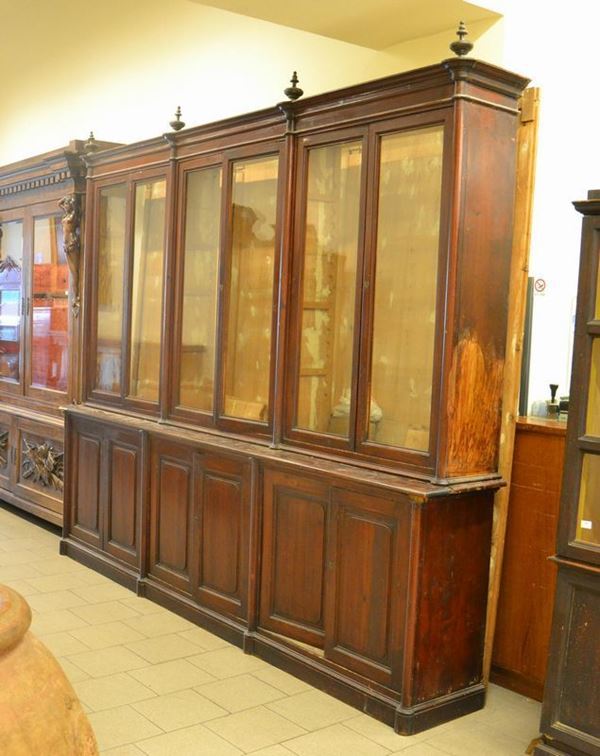Libreria, Toscana, sec. XIX, in abete, a due corpi, dodici sportelli sei dei quali