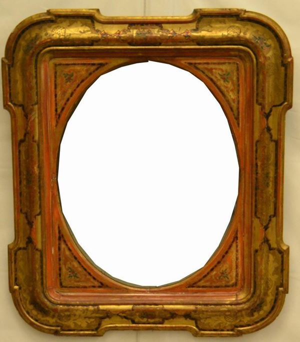 Specchiera ovale, Francia, sec. XIX, entro cornice in legno laccato e sagomato, cm 86x75