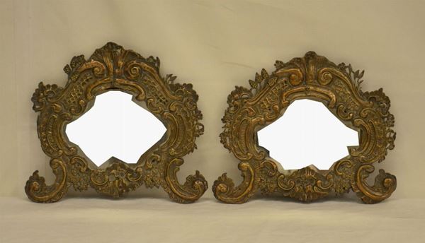 Due cartaglorie, Toscana, sec. XVIII, in metallo lavorato e argentato, alt. cm 29 e cm 27 ( 2 )
