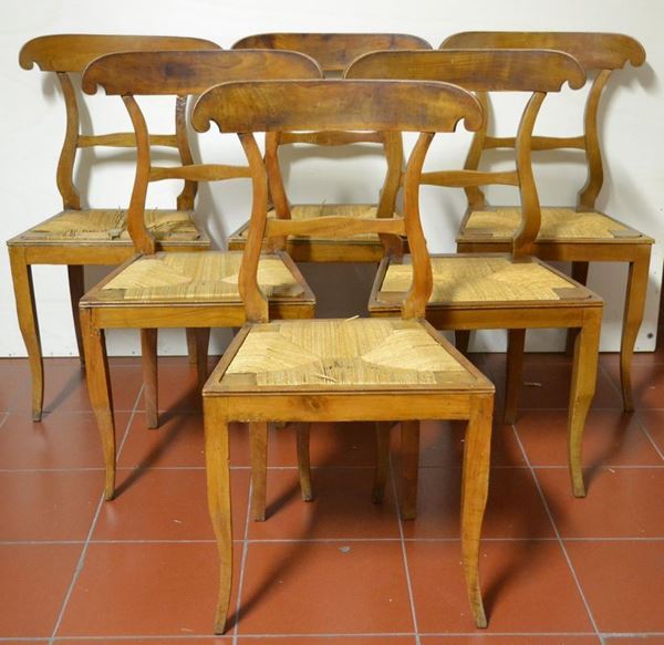  Sei sedie, Toscana, fine sec. XVIII , in ciliegio, spalliera avvolgente, montanti a lira, gambe a sciabola,  restauri e danni 