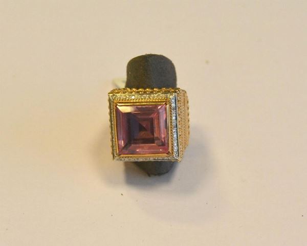 Anello in oro giallo, bianco titolo 375 ,diamanti e terbium                