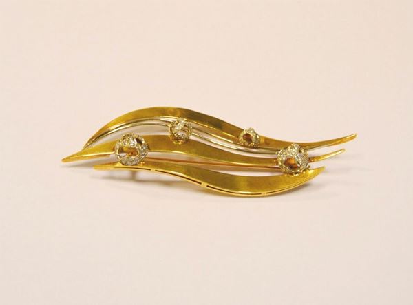  Spilla in oro giallo e diamanti 