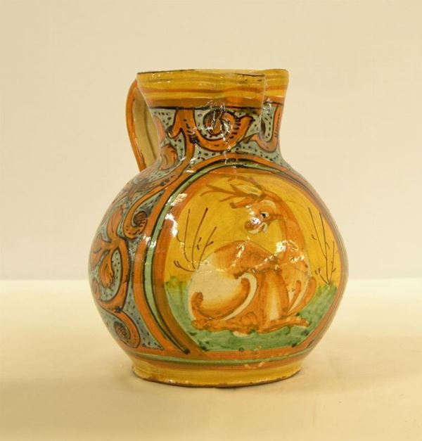 Grande vassoio tondo, zona fiorentina-Montelupo,  metâ”œÃ¡ sec. XV, in maiolica decorata nei toni del verde a motivi geometrici, alt. cm 23, danni e restaur
