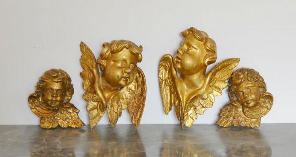  Coppia di sculture, sec. XVIII,  in legno dorato 