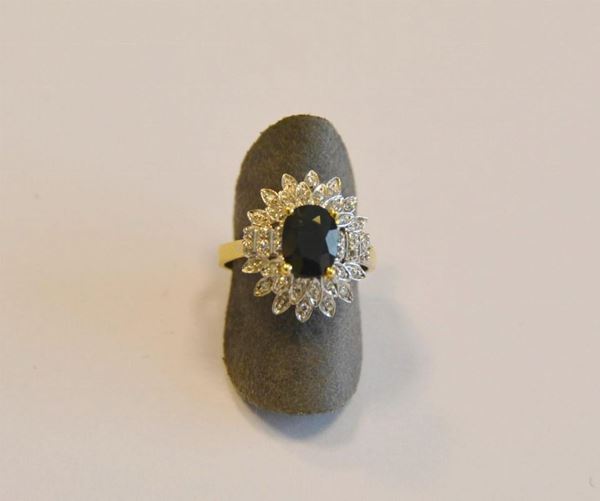  Anello in oro giallo e bianco,zaffiro e diamanti 