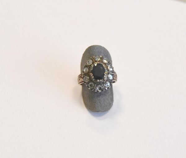   Anello in oro,argento, zaffiro e diamanti 