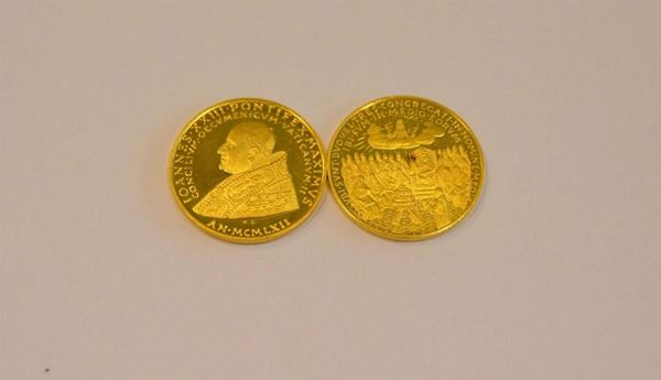  Quattro medaglie in oro 900/1000 