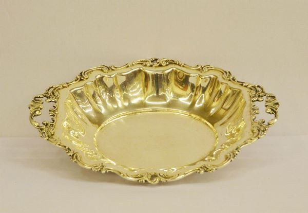  Centrotavola, sec. XX,  in argento sagomato,   - Asta Decorazione di interni - Poggio Bracciolini Casa d'Aste
