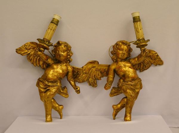  Coppia di putti, sec. XIX,  ad uso di applique,