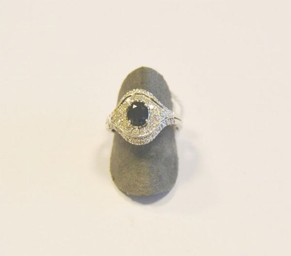  Anello in oro bianco,zaffiro e diamanti  