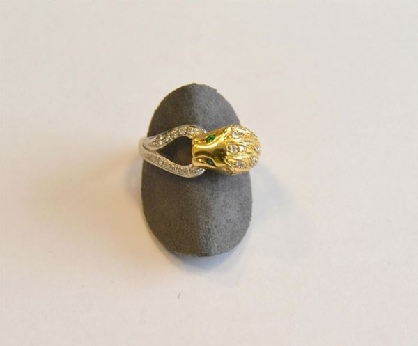  Anello in oro giallo e bianco, e diamanti , 