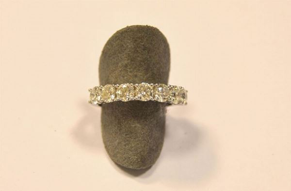  Anello rivier , in oro bianco e diamanti 