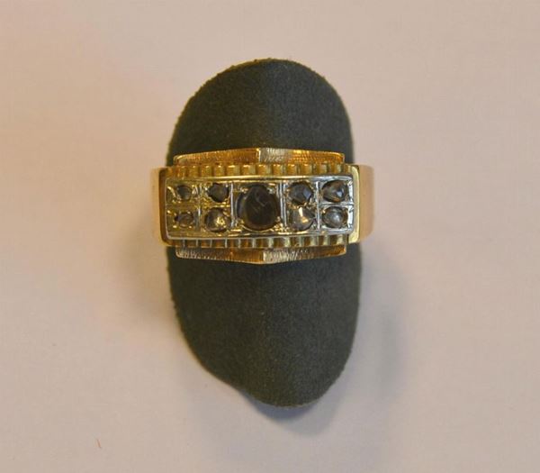  Anello in oro giallo e diamanti 