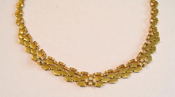  Collana in oro giallo e pietre  