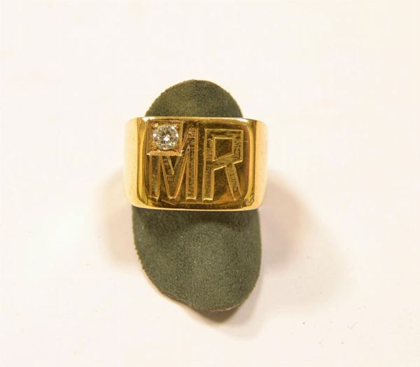  Anello per uomo, in oro giallo e diamante 