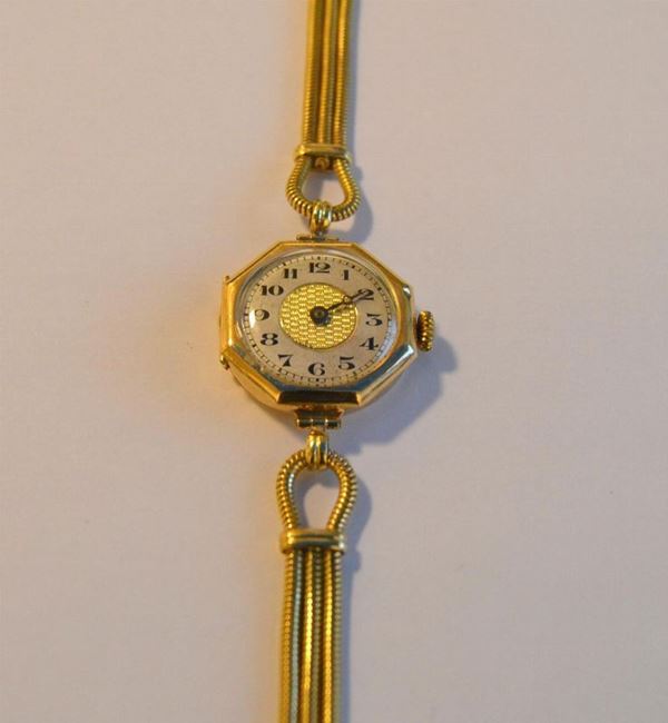   Orologio da polso per signora   in oro giallo  