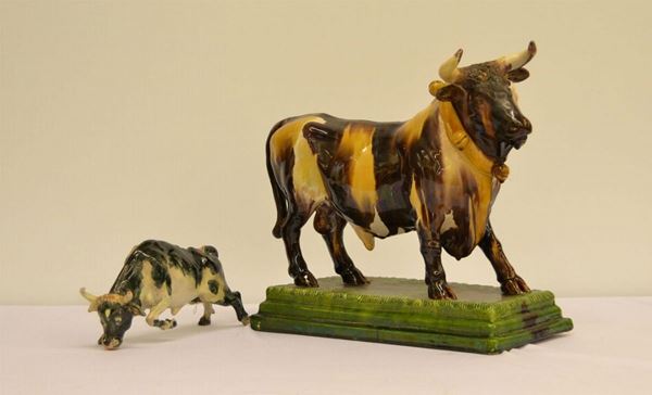  Due sculture, inizi sec. XX,  in ceramica e maiolica