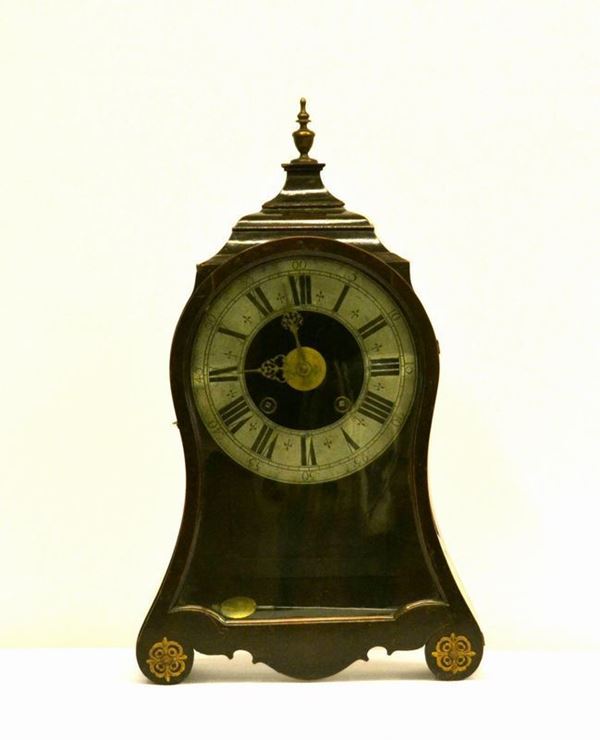  Orologio da tavolo, Francia, sec. XIX,  cassa in mogano sagomato, 