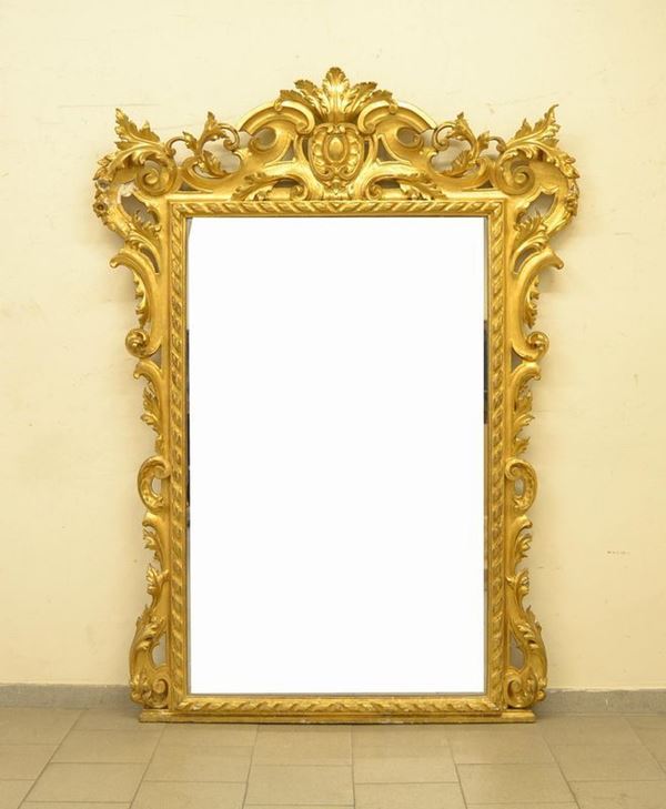  Specchiera, Toscana, sec. XIX,  in legno dorato e 