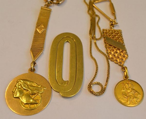  Due portachiavi in oro giallo , 